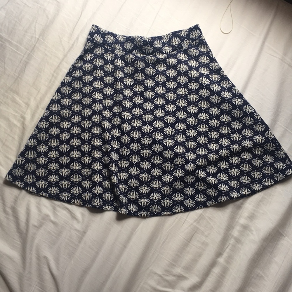 Blue circle mini skirt with white lotus patterns